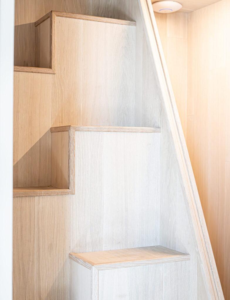 Light wooden compact staircase